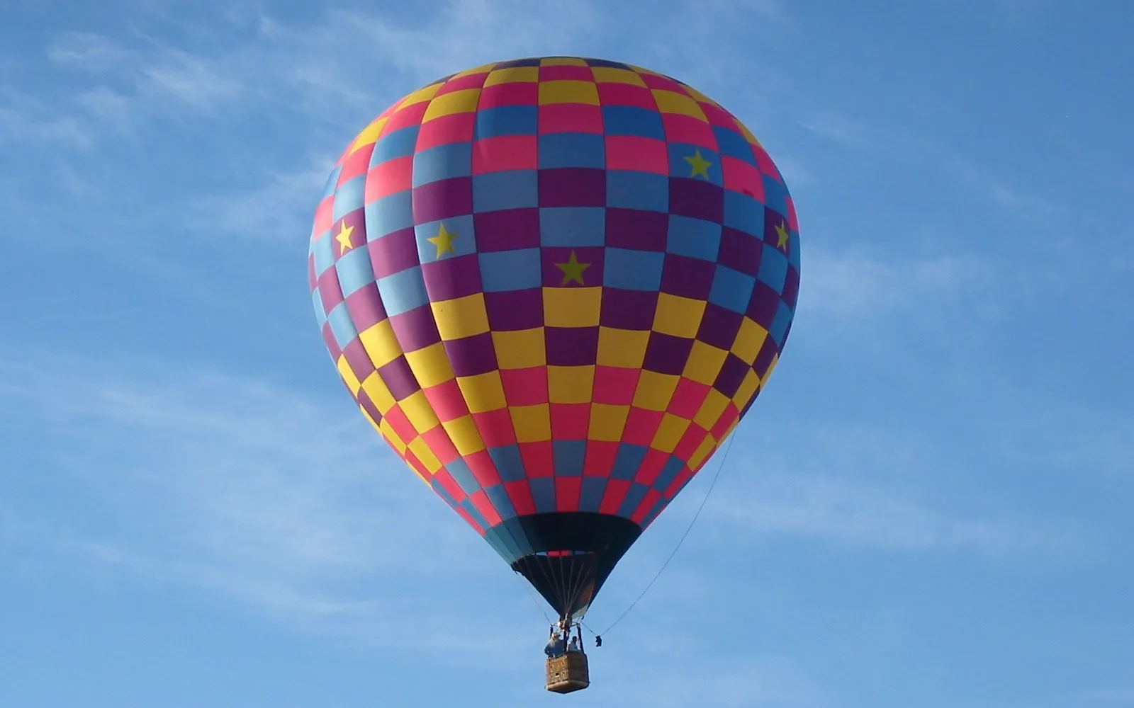 A hot air balloon in blue sky